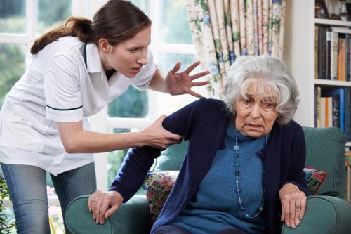 A nursing home employe acting aggressive towards a resident.